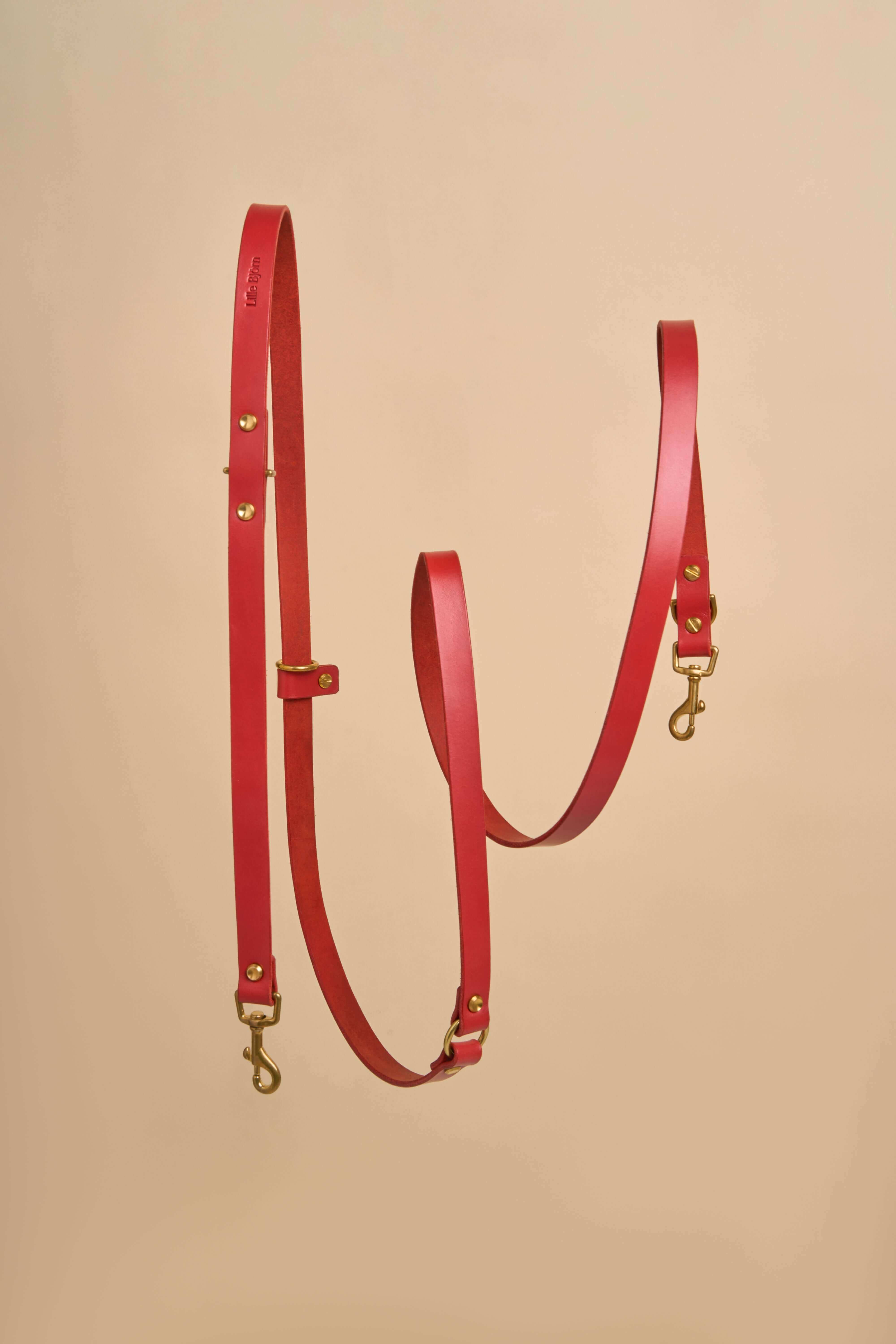 Omni Red Leather Dog Leash offering hands-free and cross-body options, made from high-quality Italian leather with robust brass hardware, perfect for a stylish and practical walking experience