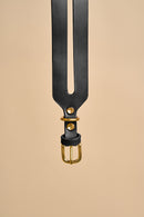 Close-up of the buckle on Aeris Wide Black Dog Collar, featuring solid brass hardware and premium Italian leather for a secure fit