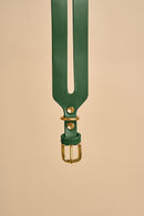 Detailed view of the buckle on Aeris Wide Green Dog Collar, showcasing solid brass hardware and premium leather for durability