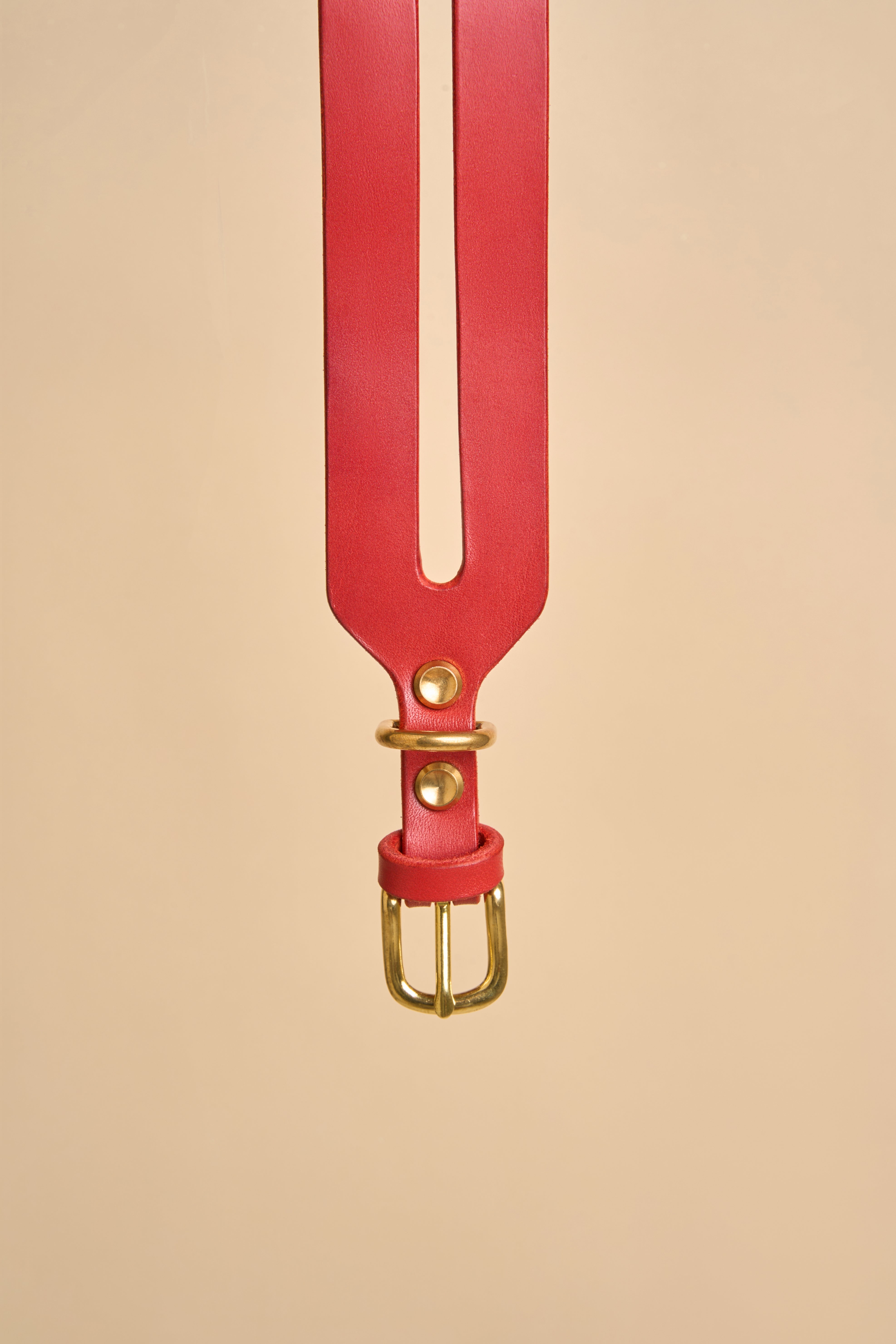 Close-up of the brass buckle on Aeris Wide Red Dog Collar, crafted from premium Italian leather for a secure, comfortable fit