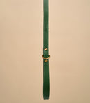 Close-up detail of Classic Green Leather Dog Leash handle with embossed design, crafted from high-quality Italian leather and brass hardware