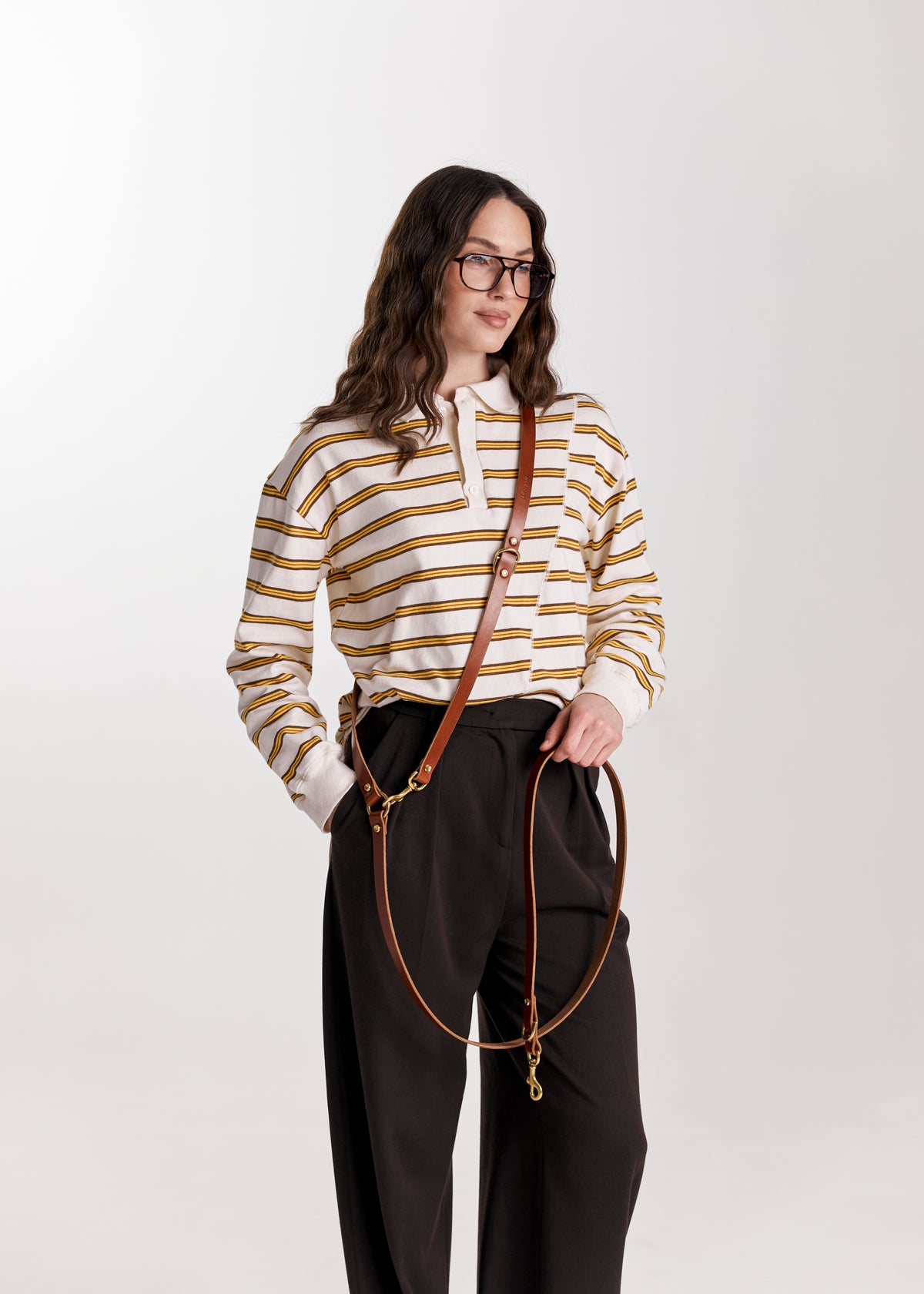 Brown Omni leather dog leash worn cross-body