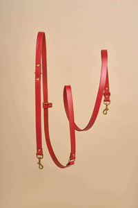 Omni Red Leather Dog Leash offering hands-free and cross-body options, made from high-quality Italian leather with robust brass hardware, perfect for a stylish and practical walking experience