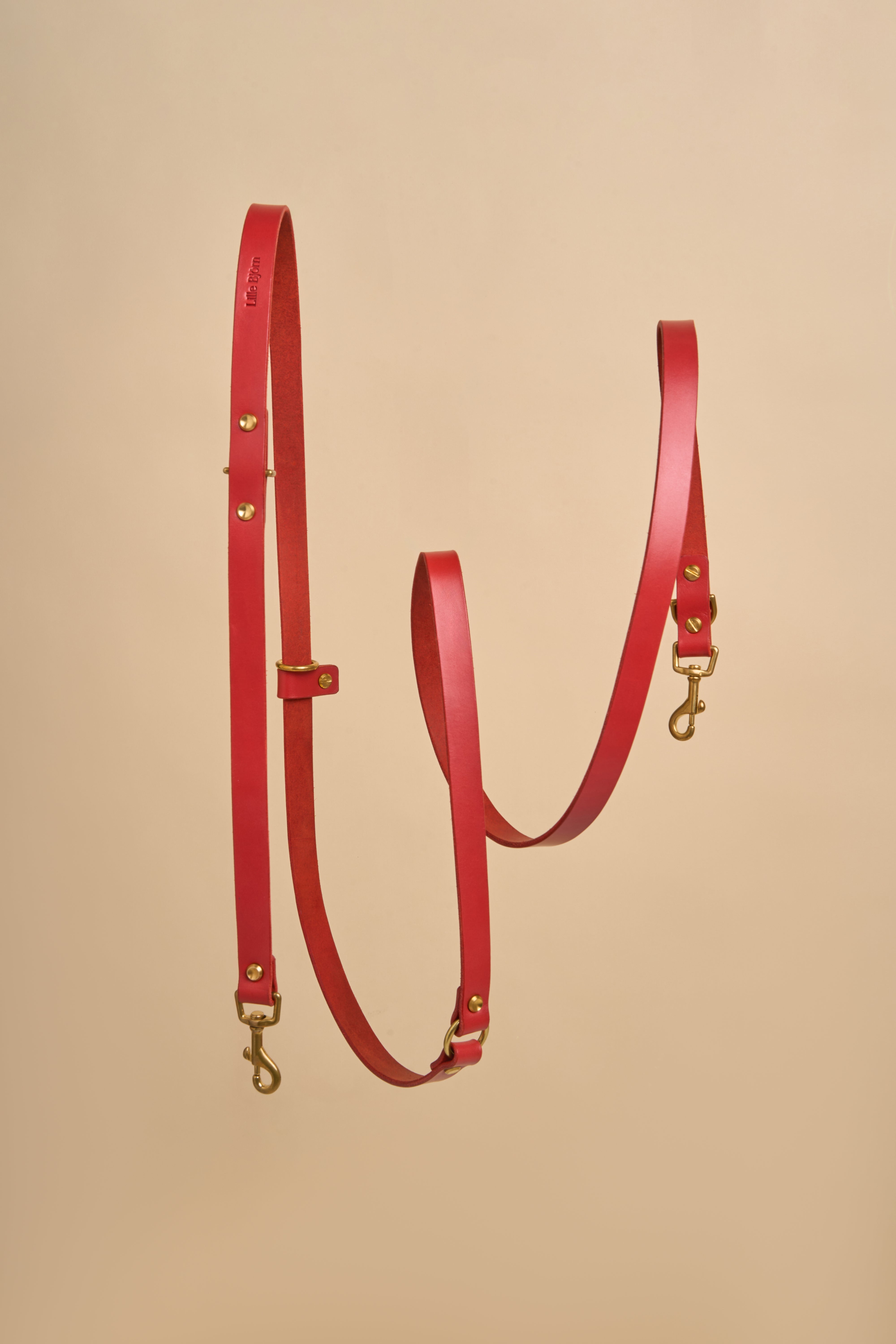 Omni Red Leather Dog Leash offering hands-free and cross-body options, made from high-quality Italian leather with robust brass hardware, perfect for a stylish and practical walking experience