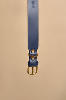 Detailed view of the brass buckle on Vero Classic Blue Leather Dog Collar, featuring durable Italian leather and brass hardware