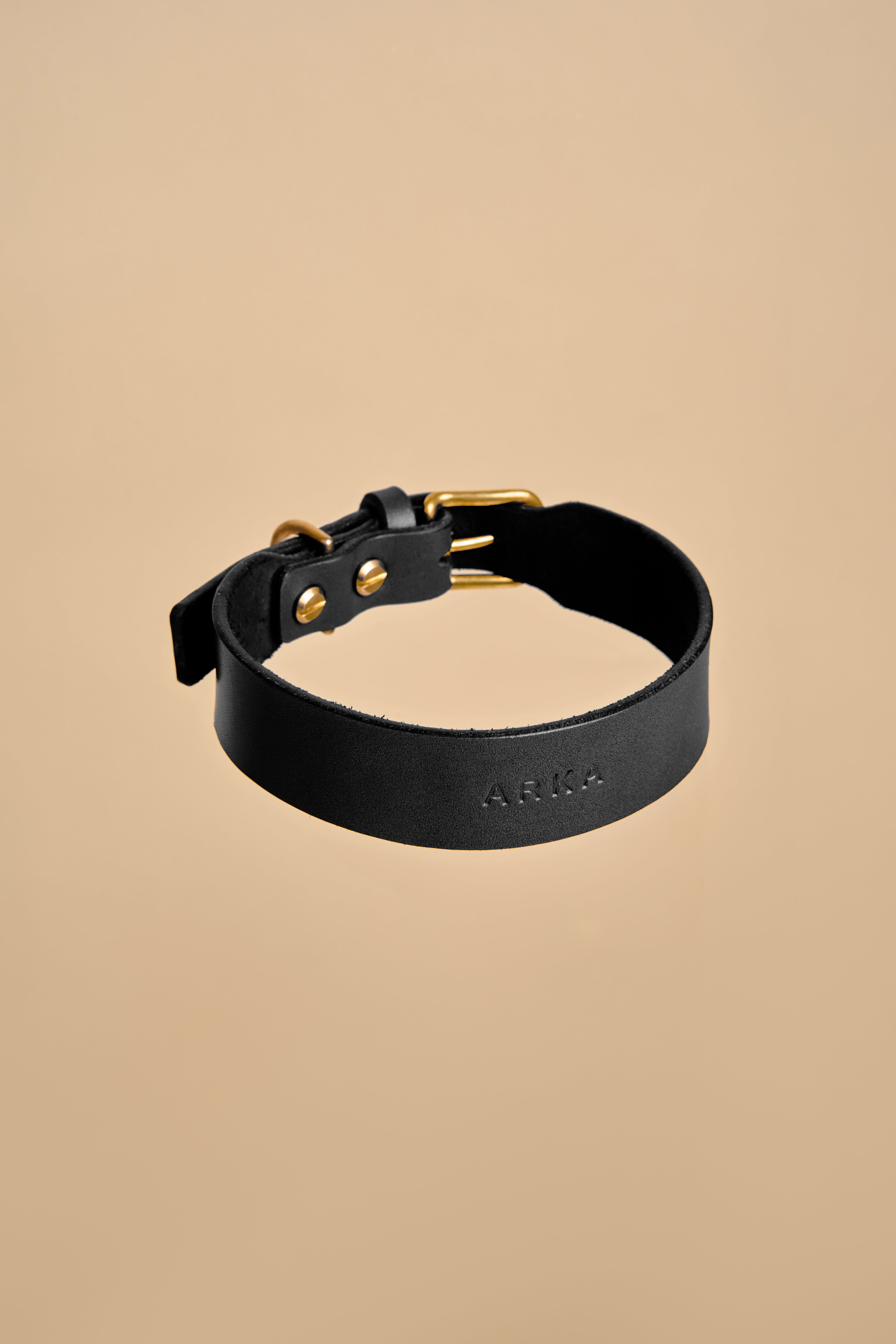 Vero Classic Black Leather Dog Collar featuring premium Italian leather and adjustable brass hardware for a sleek and durable design.