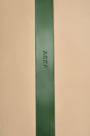 Detailed view of name embossing on Vero Classic Green Leather Dog Collar, offering customization options on high-quality Italian leather