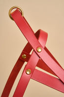 Close-up of Vero Red Leather Dog Harness, made from premium Italian leather with brass hardware for durability and quality design