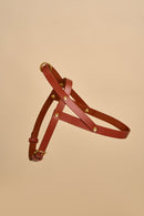 Vero Cognac Leather Dog Harness crafted from luxurious Italian leather, featuring adjustable straps and durable brass hardware, combining elegance with a comfortable and secure fit for your dog