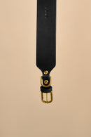 Close-up of the brass buckle on Vero Wide Black Leather Dog Collar, featuring solid hardware and durable Italian leather for a secure fit