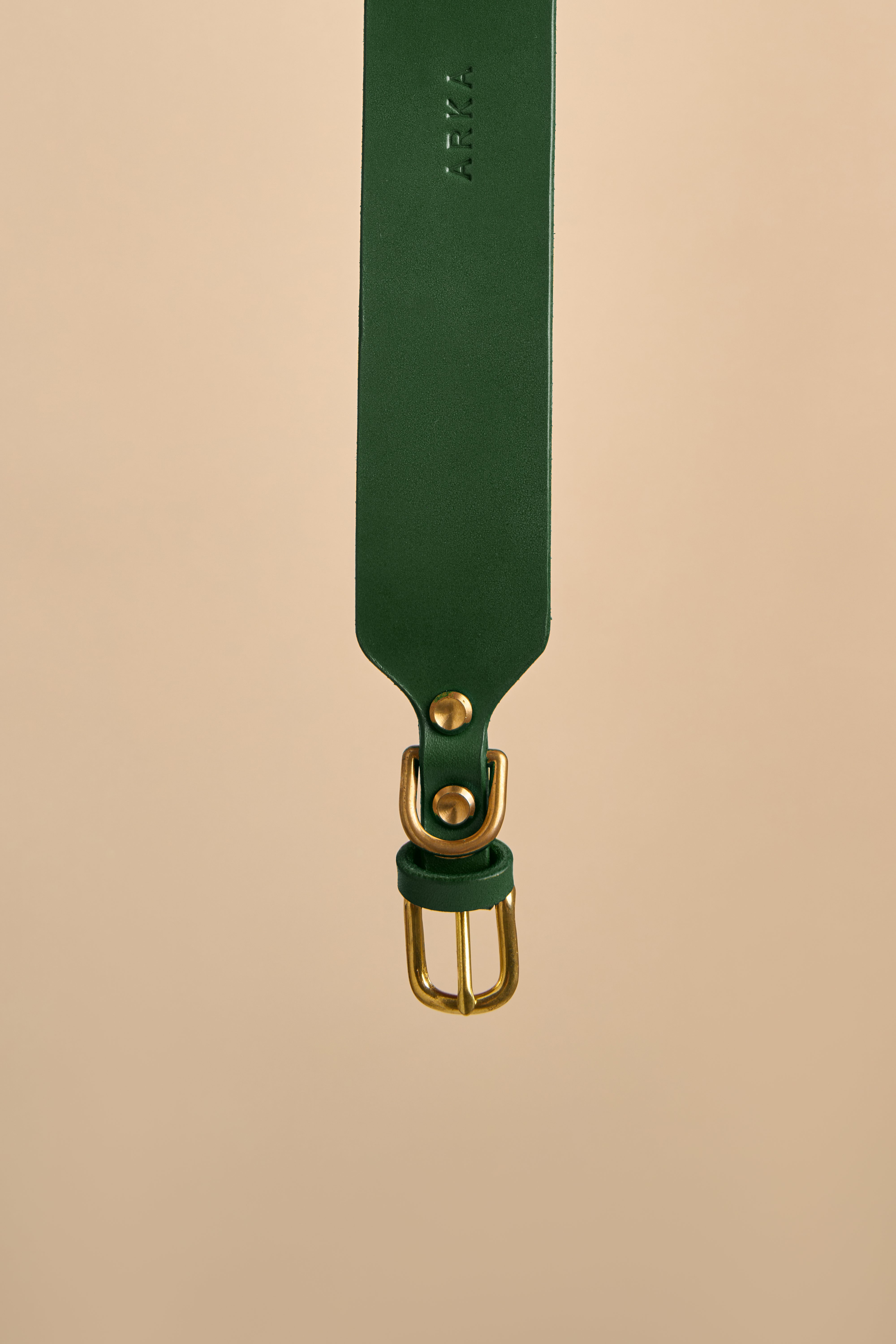 Detailed view of the brass buckle on Vero Wide Green Leather Dog Collar, crafted from durable Italian leather and solid hardware