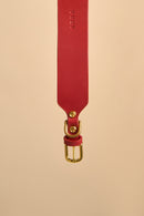 Close-up of the brass buckle on Vero Wide Red Leather Dog Collar, made from premium Italian leather for strength and durability